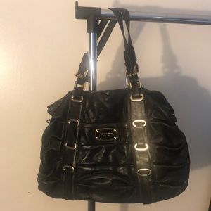 Michael Kors black handbag with gold buckles
